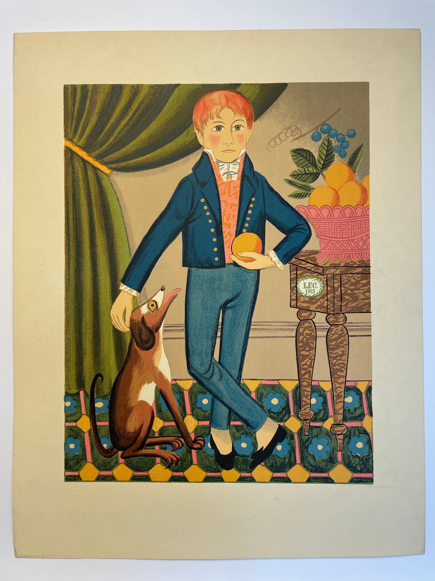 A young lad holding an orange